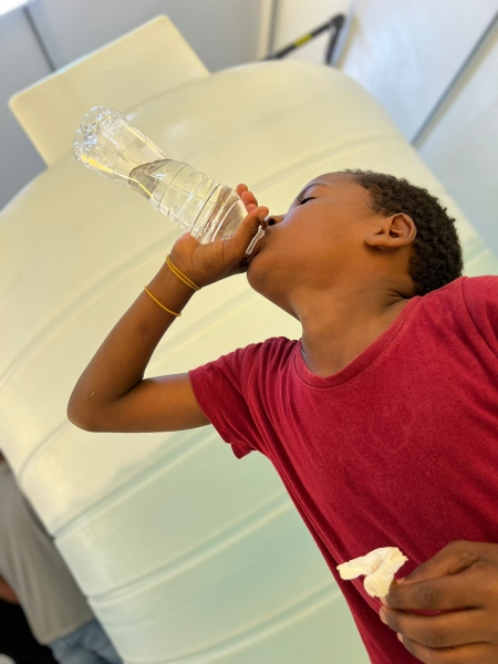 kid drinking clean water